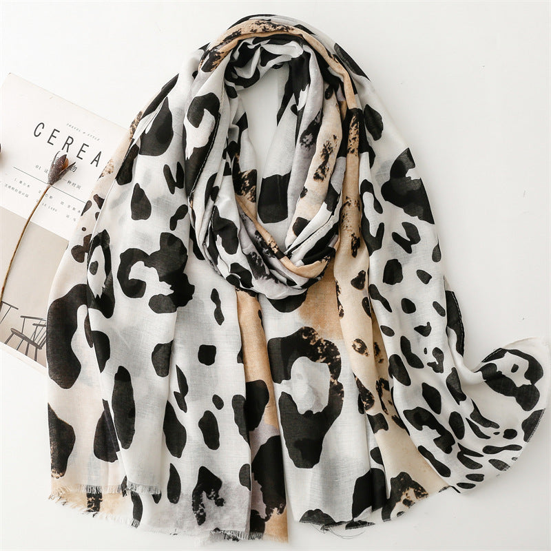 Spring and summer four seasons thin cotton and linen feel scarf European and American cloud leopard print rough edge scarf warm shawl women