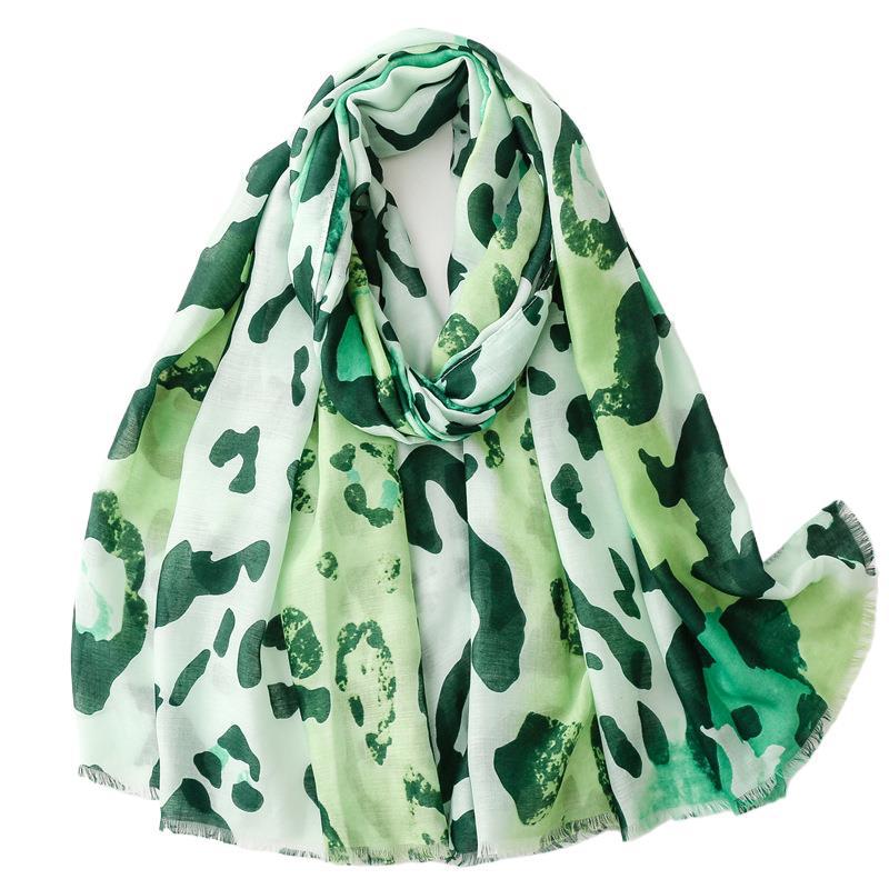 Spring and summer four seasons thin cotton and linen feel scarf European and American cloud leopard print rough edge scarf warm shawl women