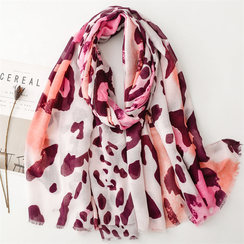Spring and summer four seasons thin cotton and linen feel scarf European and American cloud leopard print rough edge scarf warm shawl women